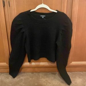 Cropped puff sleeve black sweater. Gently used.